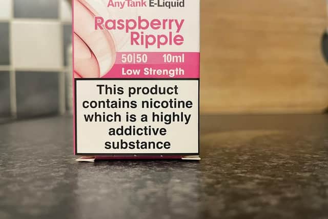 A public health warning on raspberry ripple-flavoured vaping liquid.
