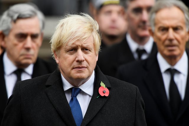 Former prime ministers, Gordon Brown (left) and Tony Blair (right) stand behind Prime Minister Boris Johnson, during the Remembrance Sunday service at the Cenotaph, in Whitehall, London.