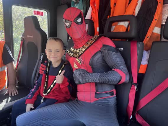 Ashfield Council chairman Coun Dale Grounds (as Spider-Man) gave youngster Harley a tour of the council offices and Kirkby Leisure Centre