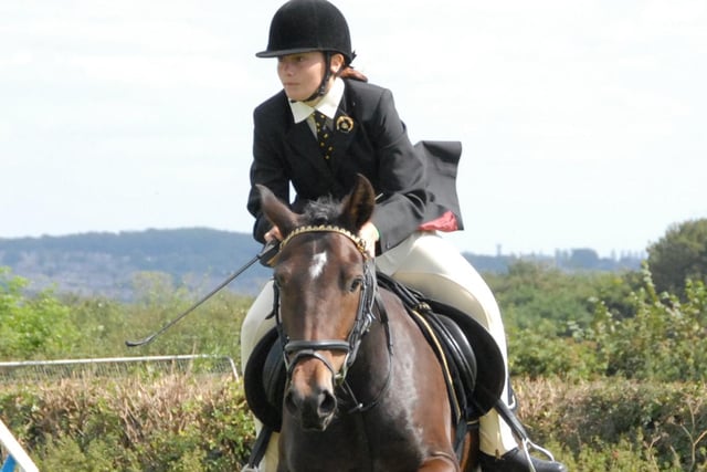 2006: Megan Hague rides to a third place finish at the Moorgreen Show.