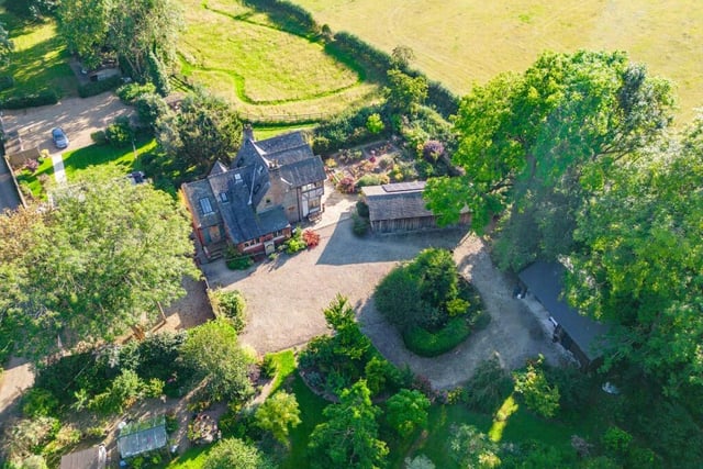 Before we step inside the house, here is a bird's eye view of how it sits within the Newstead Abbey Park landscape, complete with annexe. The plot extends to an acre of idyllic, mature gardens.
