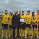 Hucknall are presented with the March Team of the Month award by UCL chairman Alan Poulain.