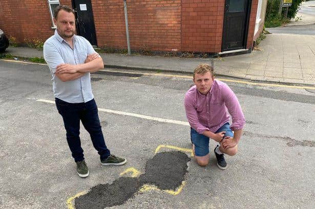 Couns Jason Zadrozny (left) and Tom Hollis with a ViaFix road repair in Ashfield which the Ashfield Indpendents say are 'botch jobs'