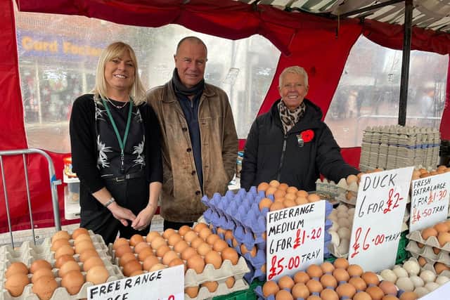 Market traders Alan and Jan Walker say people are trying to support the market