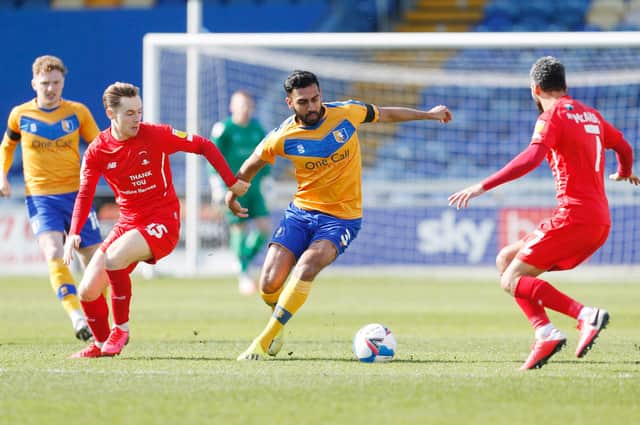 Mansfield Town's Malvind Benning (C) in action with Leyton Orient's Dan Kemp (L) and Leyton Orient's Jobi McAnuff. Picture: Craig Brough/AHPIX LTD