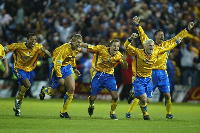 The Mansfield team celebrate after winning on penalties in the 2004 play-off semi-final.