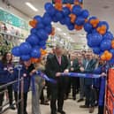 Coun Keith Girling cuts the ribbon to officially open the new The Range store in Hucknall. Photo: National World
