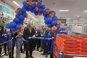 Coun Keith Girling cuts the ribbon to officially open the new The Range store in Hucknall. Photo: National World