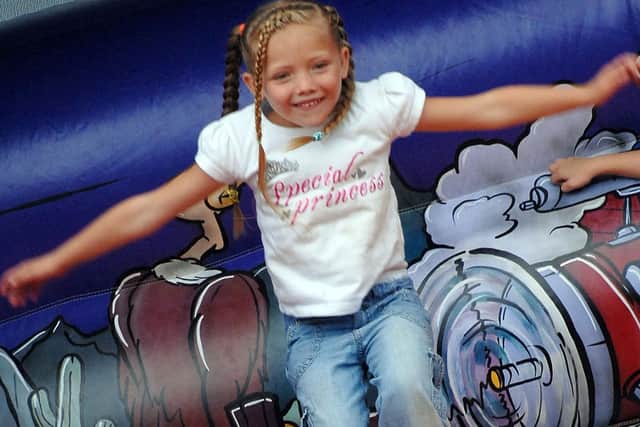 This young lady is having lots of fun on the giant inflatable slide at Bulwell’s Fun on the Forest.
