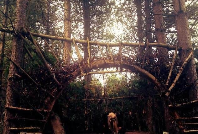 Michaela White pictured at the treehouse when she was a teenage - the friend are now all in their mid-twenties. Courtesy Jessica RImmington.