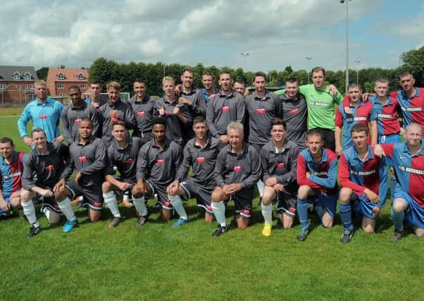 The local Dowhan family were involved in a Charity Football Tournament, Auction & Fun Day, in Memory Craig Dowhan, held at Rolls Royce Leisure, Hucknall.
NHUD 1-8-15 Dowhan, Some of the players who took part in the Tournament,
Chris Dowhan is Centre Front  (5 & 6)