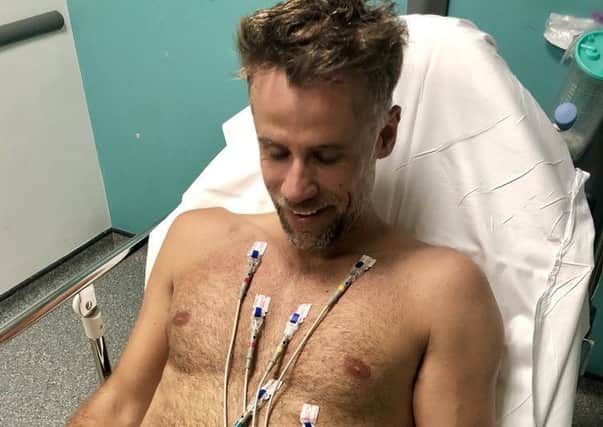 Richard Bacon shared this picture of himself hooked up to machines in hospital.