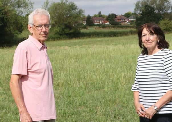 Phil Oxley and cllr Meryl Topliss of the Brinsley steering group at their preferrred development site