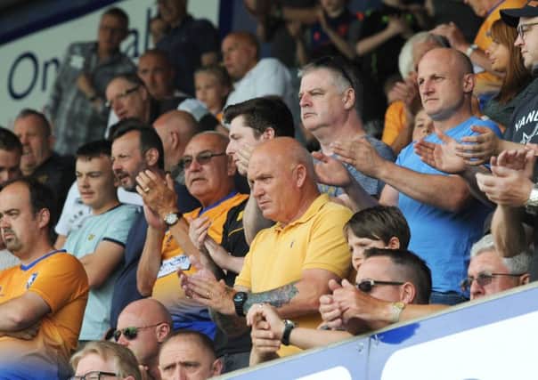 Mansfield Town fans enjoying Saturday's 0-0 draw with Sheffield United. Pics by Anne Shelley.
