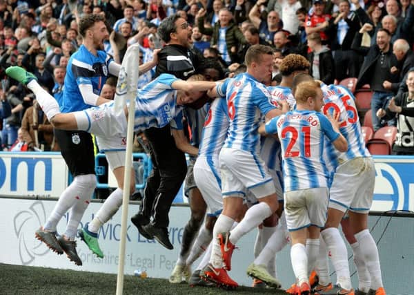 David Wagner joins in the celebrations after Tom Ince scores the match winning goal.
Huddersfield Town v Watford FC. Premier League. John Smiths Stadium.
14 April 2018. Picture Bruce Rollinson