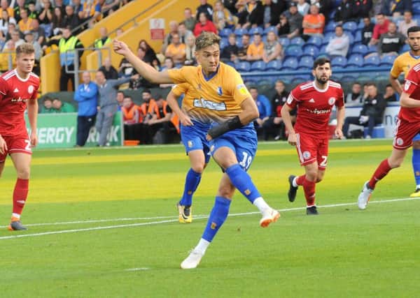 Mansfield Town v Accrington Stanley.
Tyler Walker converts the first of his penalty kicks to level the scores.