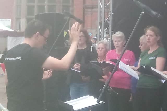 Torkard Ensemble's choir entertained the crowds in Hucknall marketplace ahead of the Tour of Britain's arrival