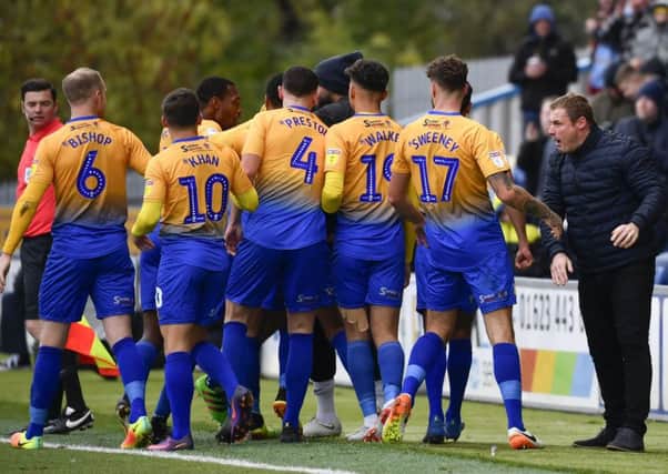Mansfield Town manager David Flitcroft celebrates with his team after they go 1-0 up: Picture by Steve Flynn/AHPIX.com, Football: Skybet League 2  match Mansfield Town -V- MK Dons at One Call Stadium, Mansfield, Nottinghamshire, England on copyright picture Howard Roe 07973 739229