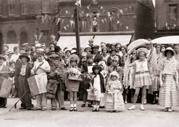 1934: These children are looking fantastic in their costumes and all ready for some fun at Hucknalls first Carnival. Picture courtesy of Nottinghamshire Archives.