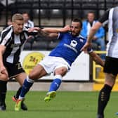Ryan Yates battles for the ball for Notts County against Chesterfield