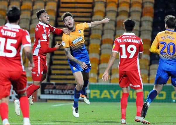 Mansfield Town v Scunthorpe Utd., Checkatrade Trophy.     
Ryan Sweeney clears his lines in the first half.