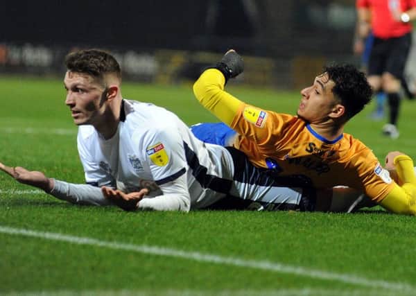 Mansfield Town v Bury.
Tyler Walker looks for a penalty decision in the second half.
