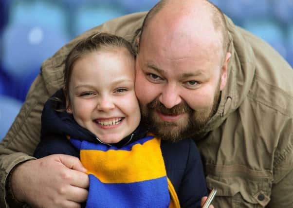 Mansfield Town v Notts County fans gallery.