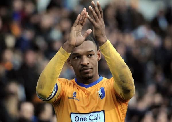 Mansfield Town v Notts County    
Stags' captain, Krystian Pearce applauds the crowd after Mansfield's win over Notts County.