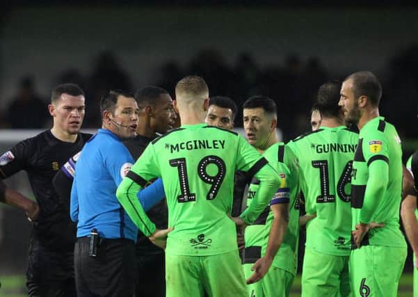 Picture by Gareth Williams/AHPIX.com; Football; Sky Bet League Two; Forest Green Rovers v Mansfield Town; 15/12/18  KO 15:00; The New Lawn; copyright picture; Howard Roe/AHPIX.com; Referee James Lingington asks Mansfield and Forest Green Rovers players if they wish to continue before abandoning the game at half time