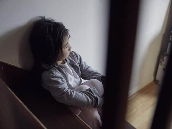 The charity is urging the government to recognise children living with domestic abuse as victims under law. Photo - NSPCC