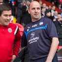 Nigel Clough and Paul Cook, then managers of Sheffield United and Chesterfield, have seen their odds shortened for the vacant Forest post