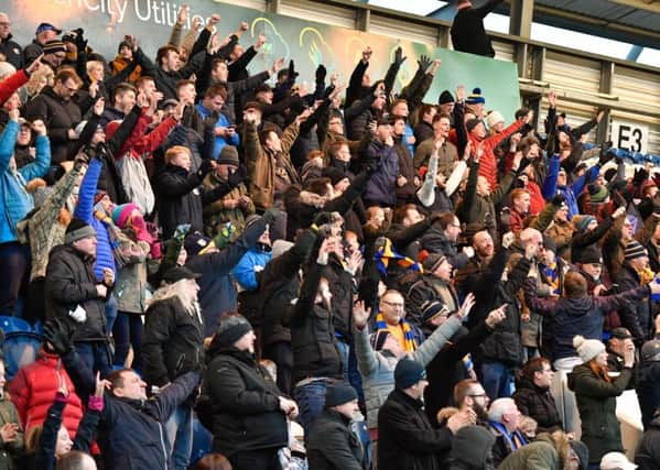 Stags fans celebrate their second goal: Picture by Steve Flynn/AHPIX.com, Football: Skybet League Two  match Colchester United -V- Mansfield Town at JobServe Community Stadium, Colchester, Essex, England on copyright picture Howard Roe 07973 739229
