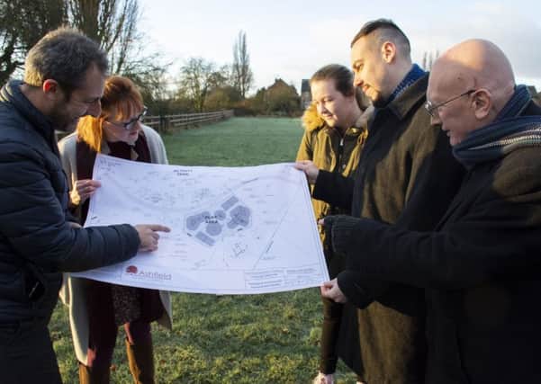 Park plans being studied by councillors Lauren Mitchell, Keir Morrison and John Wilmott, with Lee Sycamore, of the council, and Cheryl Raynor of WREN.