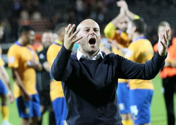 Mansfield manager Adam Murray celebrates the win at local rivals Notts County - Pic by: Richard Parkes