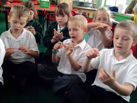 2007: Children from Annie Holgate Infant School in Hucknall are pictured here being taught sign language. Did you go to this school?