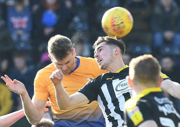 Picture by Howard Roe/AHPIX.com;Football;Skybet; 
Notts County v Mansfield Town
16/2/2019  KO 1.00pm; Meadow Lane;
copyright picture;Howard Roe;07973 739229

Stag's Ben Turner heads at Countys goal