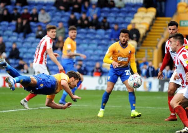 Mansfield Town v Cheltenham.        
Will Atkinson scores with a diving header to put the Stags back in front.