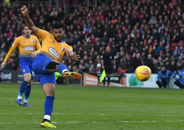Mansfield Town's Jacob Mellis scores an equaliser in added time when the Stags played at Lincoln City in November.