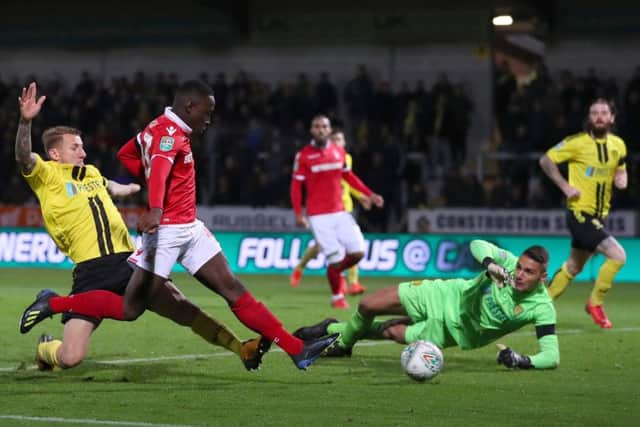BURTON-UPON-TRENT, ENGLAND - OCTOBER 30:  Arvin Appiah of Nottingham Forest beats Dimitar Evtimov of Burton Albion to score his teams second goal during the Carabao Cup Fourth Round match between Burton Albion and Nottingham Forest at Pirelli Stadium on October 30, 2018 in Burton-upon-Trent, England.  (Photo by Catherine Ivill/Getty Images)
