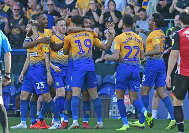 Picture Andrew Roe/AHPIX LTD, Football, EFL Sky Bet League Two, Mansfield Town v Morecambe, One Call Stadium, 19/04/2019, K.O 3pm

Mansfield's players celebrate Jacob Mellis' goal

Andrew Roe>>>>>>>07826527594