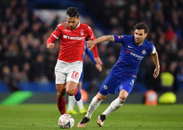 LONDON, ENGLAND - JANUARY 05:  Cesc Fabregas of Chelsea battles for possession with Joao Carvalho of Nottingham Forest during the FA Cup Third Round match between Chelsea and Nottingham Forest at Stamford Bridge on January 5, 2019 in London, United Kingdom.  (Photo by Justin Setterfield/Getty Images)