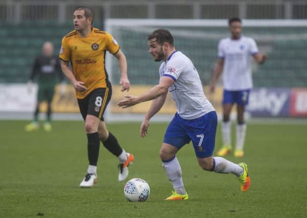 Alex MacDonald of Mansfield Town looks for a pass during the Sky Bet League 2 match between Newport County and Mansfield Town at Rodney Parade, Newport, Wales on 21 October 2017. Photo by Mark  Hawkins / PRiME Media Images.