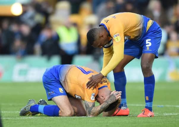 Picture by Howard Roe/AHPIX.com;Football;Skybet; Play Off Semi Final;
Mansfield Town v Newport County
12/5/2019  KO 6.00pm; One Call Stadium;
copyright picture;Howard Roe;07973 739229

Stag's Krystian Peace consoles Ryan Sweeney after losing the penalty shoot out