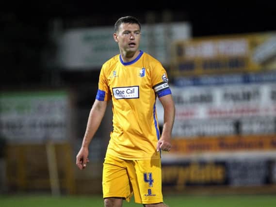 John Dempster was part of Mansfield Town's promotion-winning side under Paul Cox.