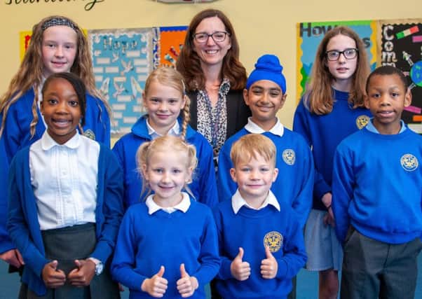 Thumbs up from pupils and head teacher Heather Gabb at Burntstump Seely Academy. (PHOTO BY: Louise Brimble)