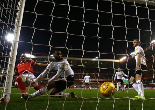 NOTTINGHAM, ENGLAND - FEBRUARY 25: Yohan Benalouane of Nottingham Forest scores a goal during the Sky Bet Championship match between Nottingham Forest and Derby County at City Ground on February 25, 2019 in Nottingham, England. (Photo by Matthew Lewis/Getty Images)