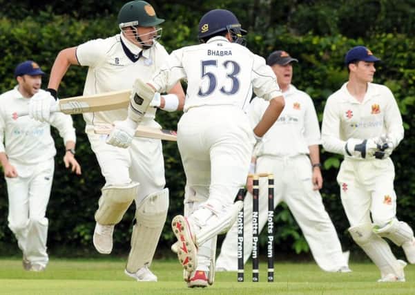 Papplewick v Wollaton 
Papplewick opener, Sam Ogrizovic calls for a run from partner Pete Bhabar.