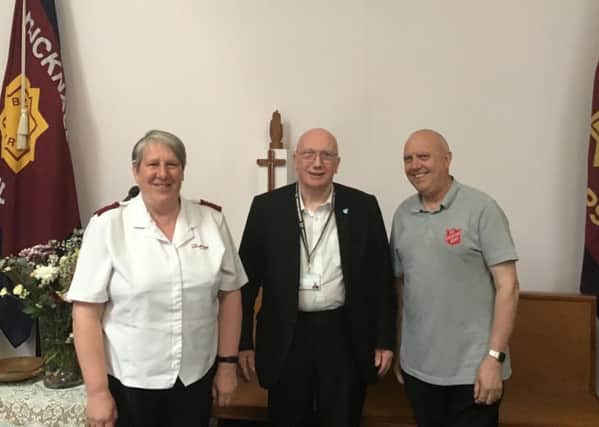 Captain Gaynor Ward, commanding officer of Hucknall Salvation Army, with her husband, Colin, and Coun John Wilmott.