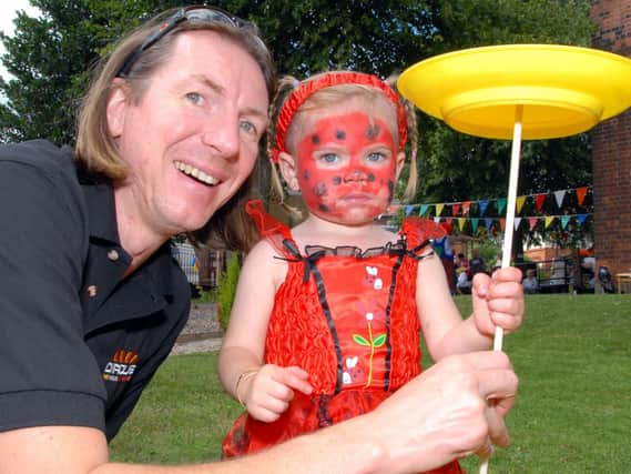 2010: Andy Vass of TheCircusWorkshop.com is pictured with Jaydee Neal who seems to be doing a great job of spinning the plate. This fabulous snap was taken at St Marys Church summer fair in Newstead. Did you go to this event?