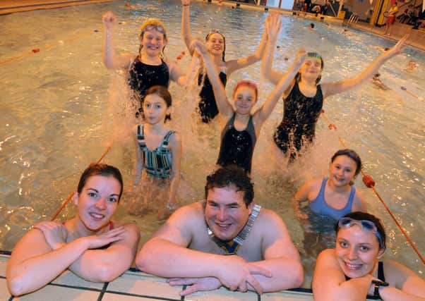 Hucknall Rotary President, Ian Young is joined by members of the 4th and 8th Hucknall Guides at a sponsored swim event at the Leisure Centre on Saturday afternoon to raise money for their group along with the Boys Brigade, Framework, the Thursday Club, 1803 Air Cadets and Pyramid Acrobatic Club.